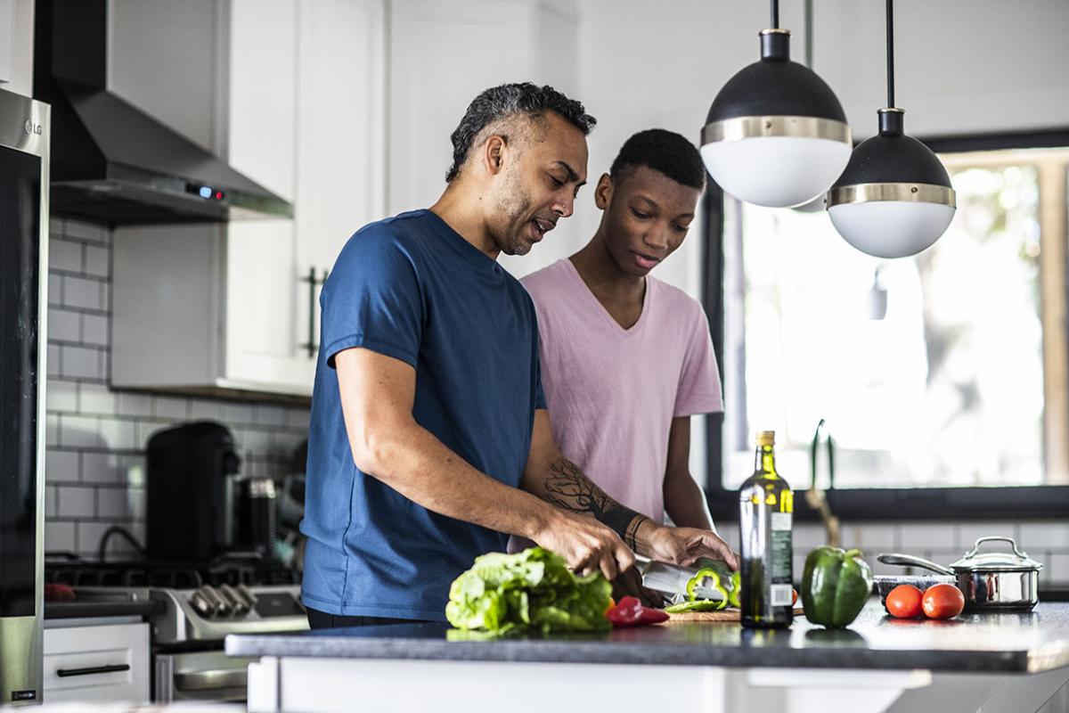 Two people in a kitchen