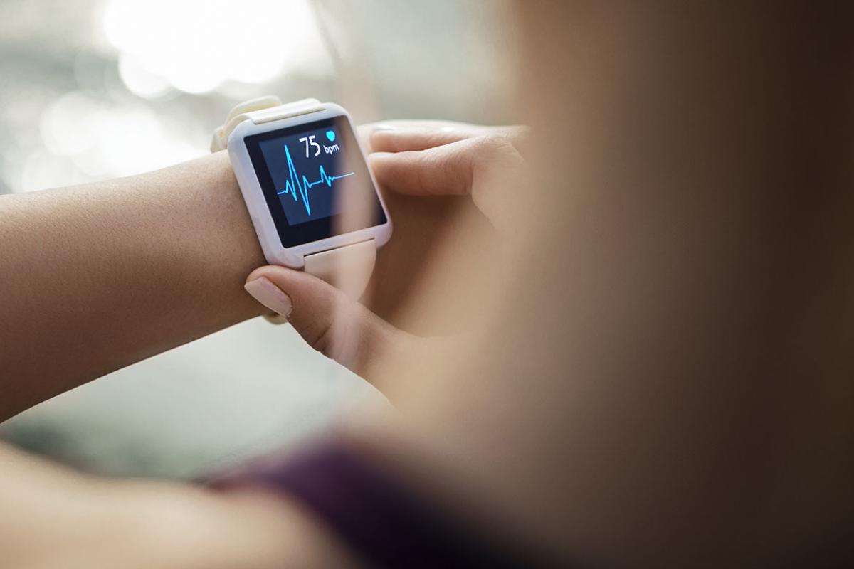 Person looking at a smart watch