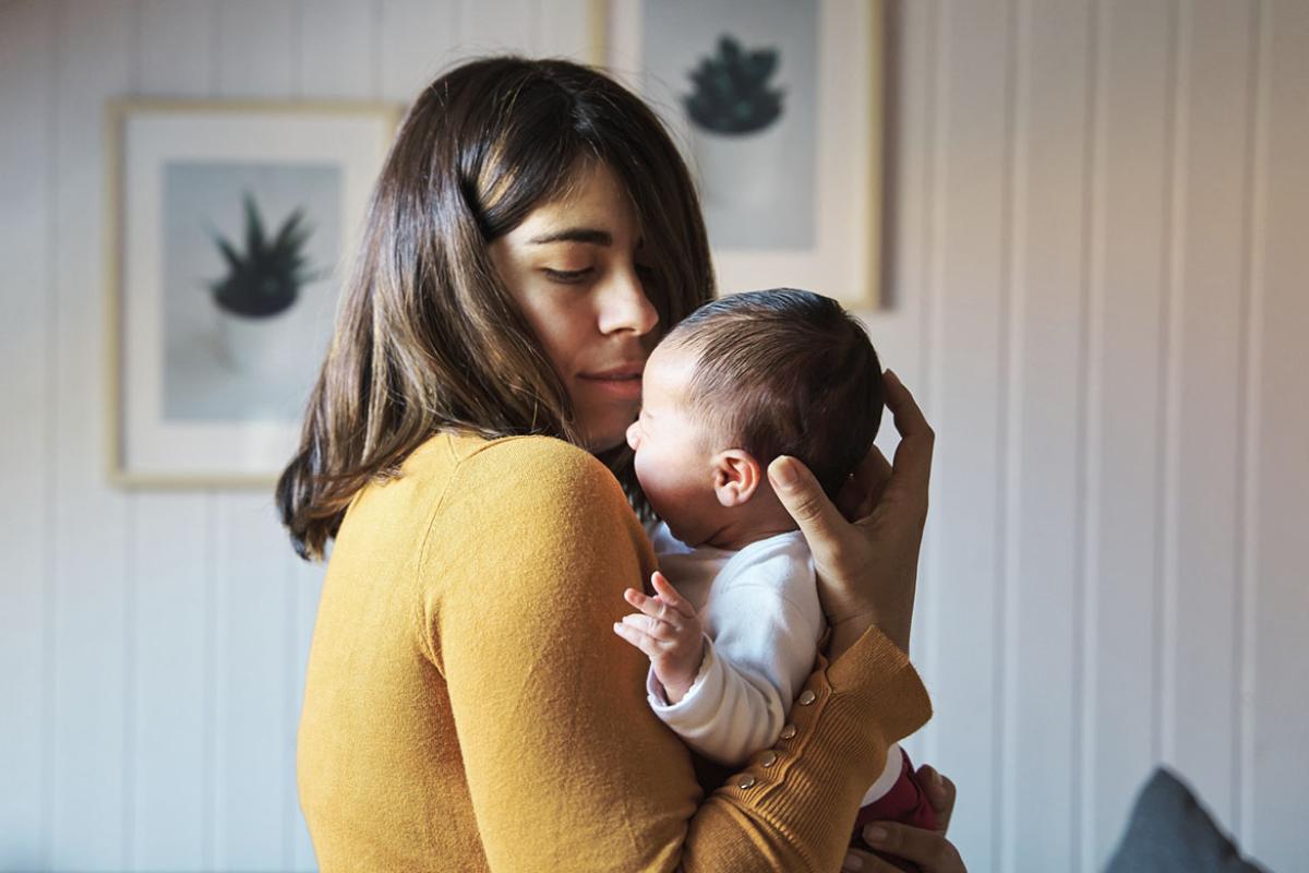 Mother holding infant